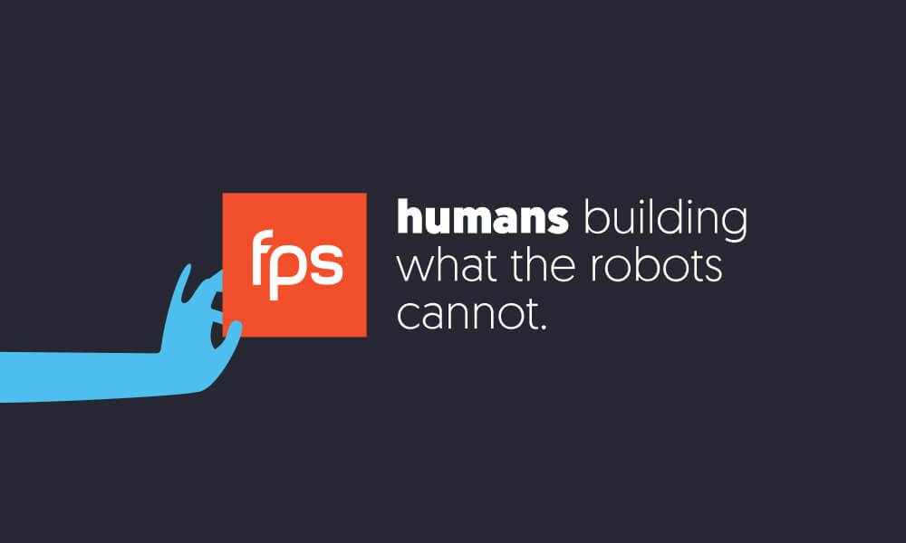humans building what the robots cannot.